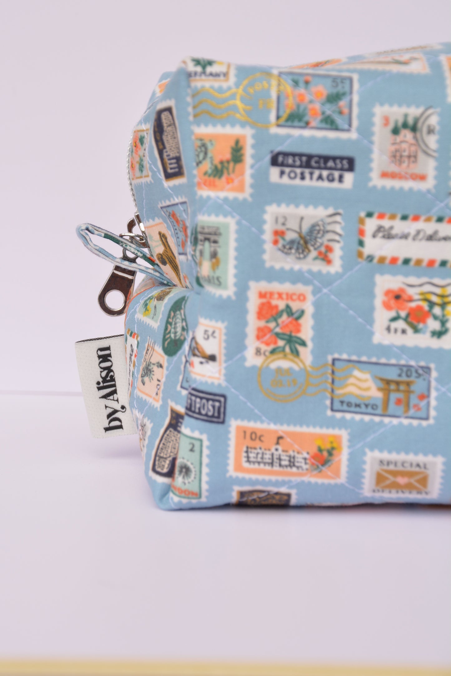 Travel Stamps Boxy Makeup Bag in Light Blue