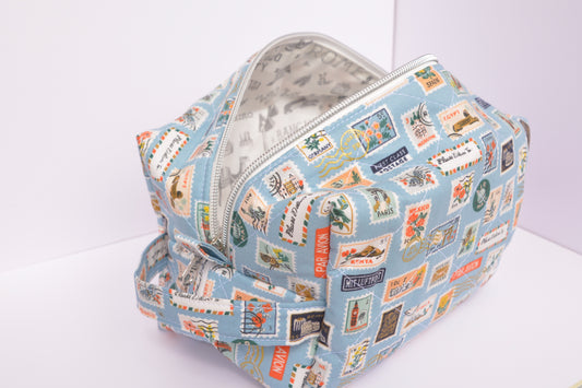 Travel Stamps Boxy Makeup Bag in Light Blue