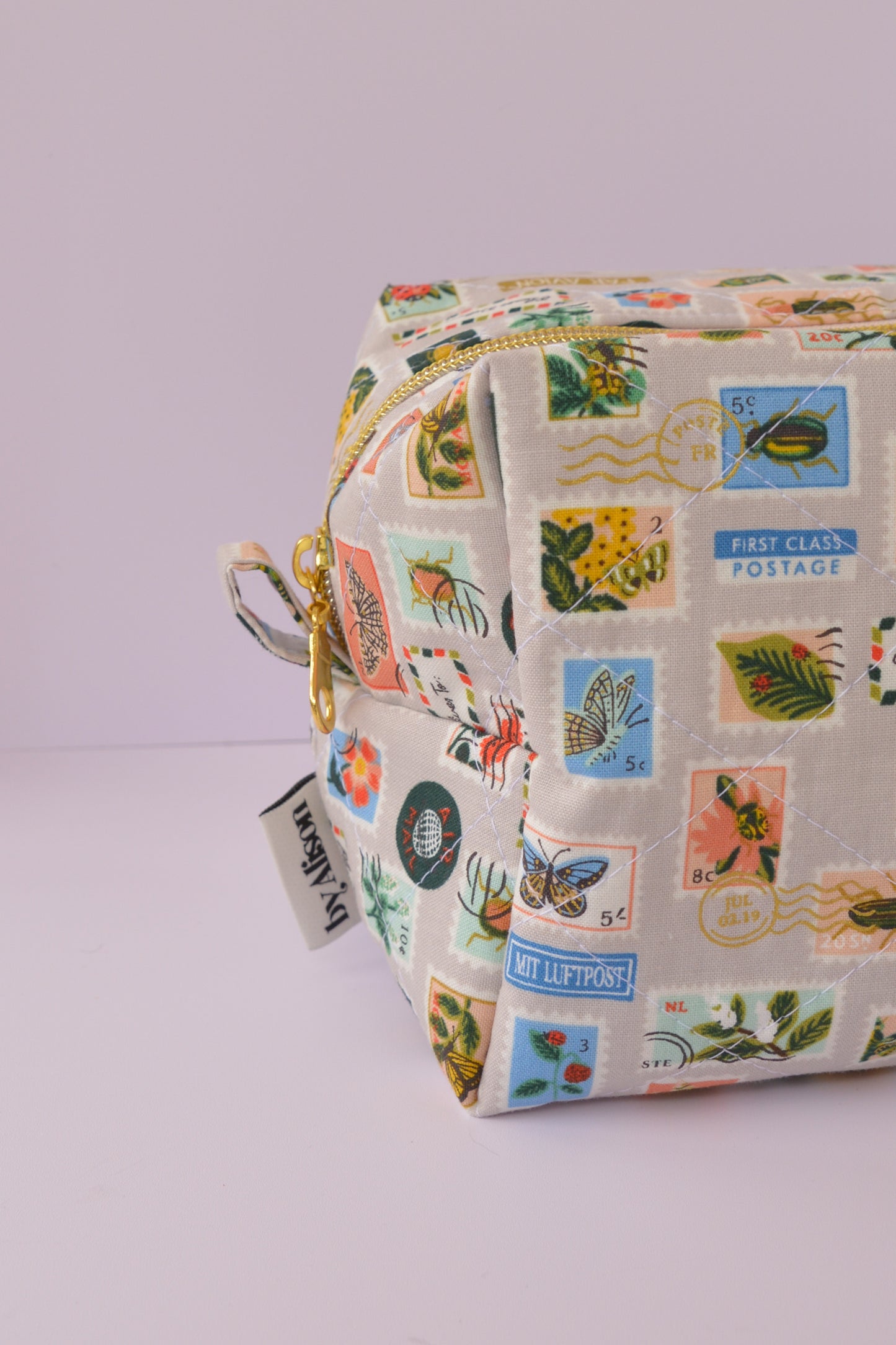 Bugs & Flowers Stamps Boxy Makeup Bag in Tan