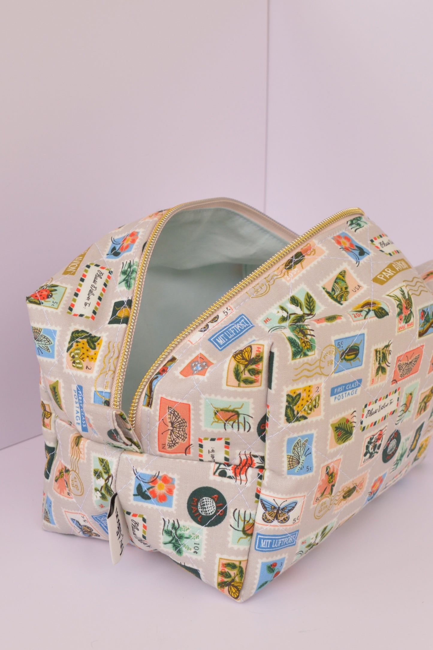 Bugs & Flowers Stamps Boxy Makeup Bag in Tan