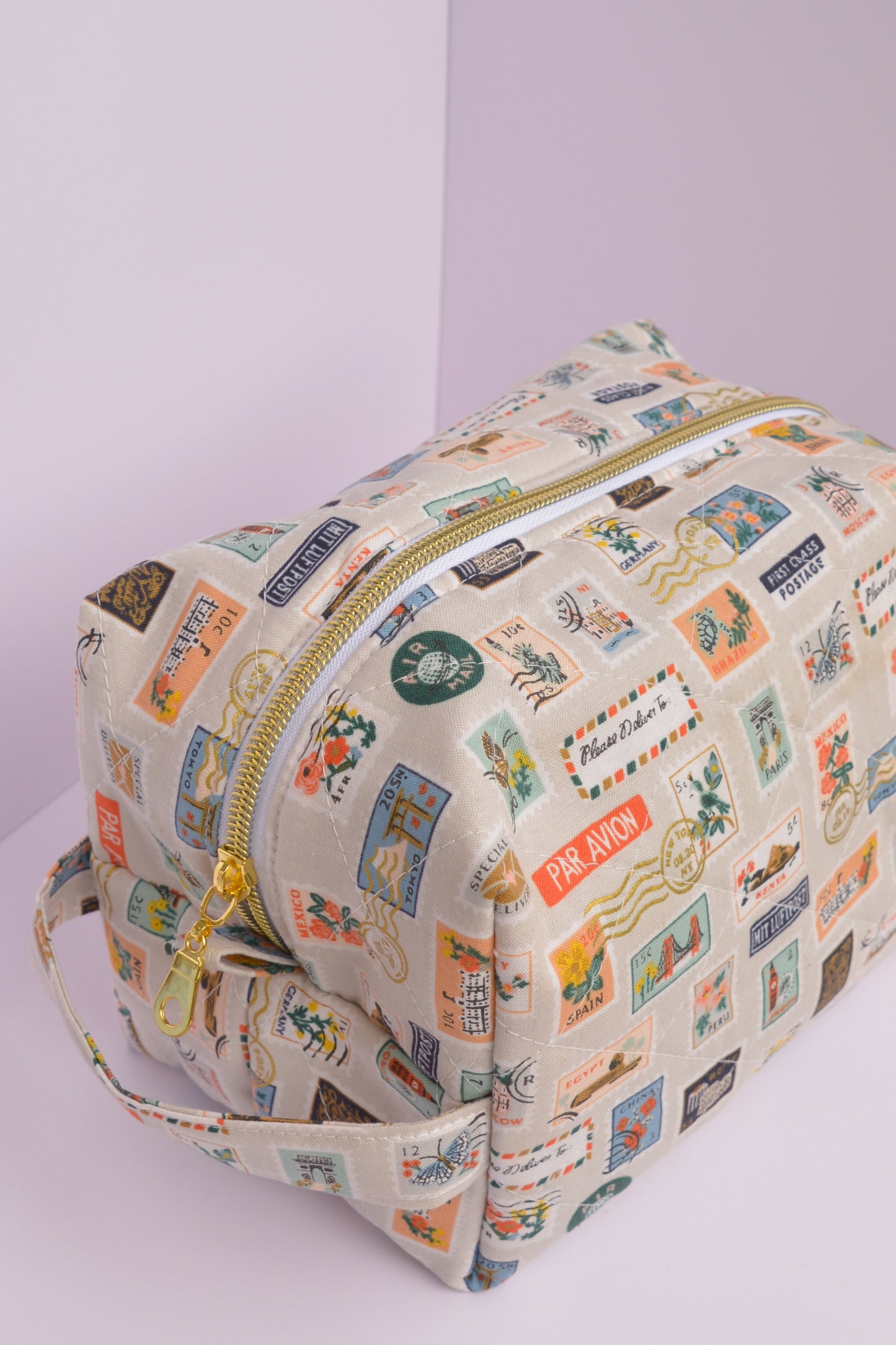 Travel Stamps Boxy Makeup Bag in Tan