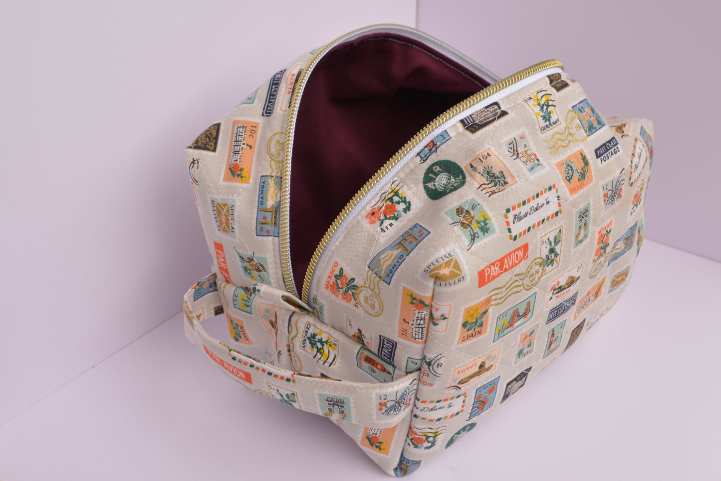 Travel Stamps Boxy Makeup Bag in Tan