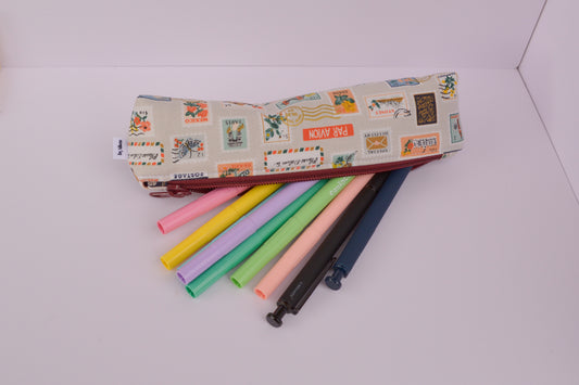 Large Pencil pouch in Tan travel stamps